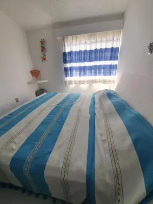 Cama o camas de una habitación en La mejor ubicación. A unas cuadras del centro