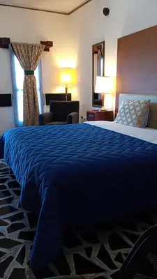 Cama o camas de una habitación en Hotel Vitorina Cholula