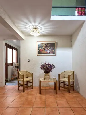 Zona de estar de La Casita del Abuelo Bonita Casa de Cantera y Adobe