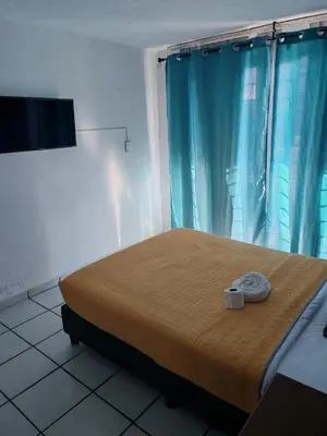 Cama o camas de una habitación en Hostal Mago