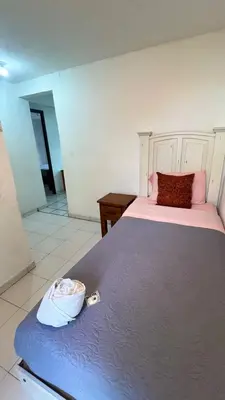 Cama o camas de una habitación en Hostal Mago
