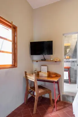 Una televisión o centro de entretenimiento en Grana B&B