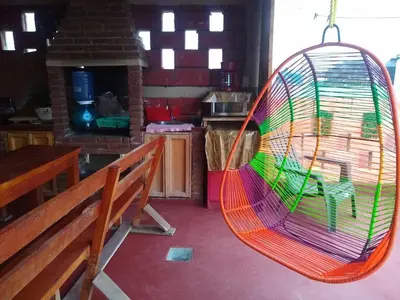 Una televisión o centro de entretenimiento en CABAÑA tipo habitación con PALAPA y Asador Planta Alta en Zacatlán