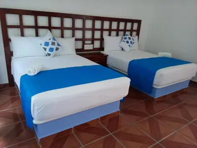 Cama o camas de una habitación en Hotel D Abril