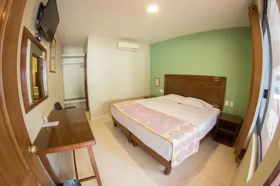 Cama o camas de una habitación en HOTEL RICARLO