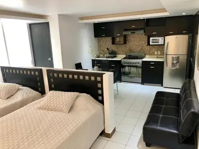 Una cocina o zona de cocina en Hotel acapulco y suites mediterrane