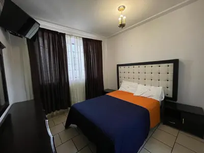 Cama o camas de una habitación en Hotel Boutique Tehuacan
