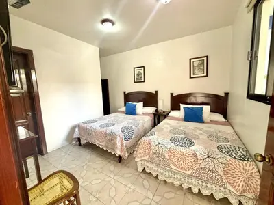 Cama o camas de una habitación en Hotel Casa Blanca
