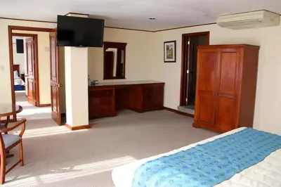Cama o camas de una habitación en Hotel Tehuacan Plaza