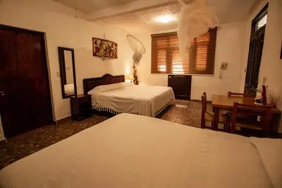Cama o camas de una habitación en Hotel boutique Teocalli