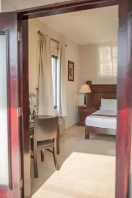 Cama o camas de una habitación en Gran Plaza Hotel Centro Histórico