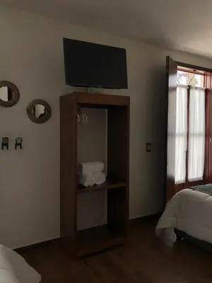 Cama o camas de una habitación en HOTEL CASA SILVESTRE
