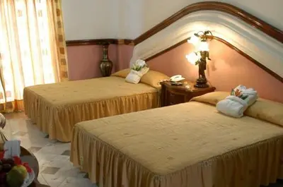 Cama o camas de una habitación en Canadian Resort Huatulco