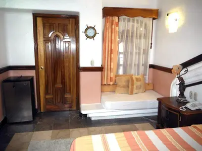 Cama o camas de una habitación en Canadian Resort Huatulco