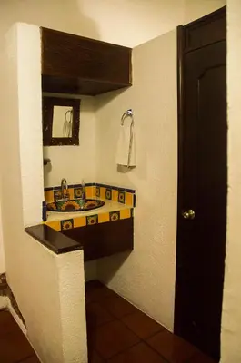 Un baño de Las Mariposas Hotel & Studios