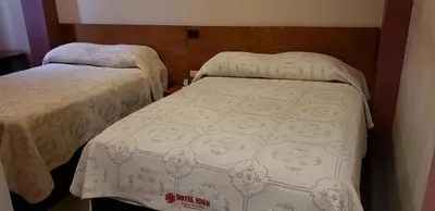 Cama o camas de una habitación en Hotel Edén