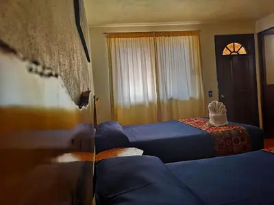 Cama o camas de una habitación en Hotel Tlatoani