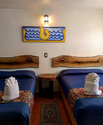 Cama o camas de una habitación en Hotel Tlatoani