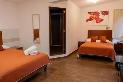 Cama o camas de una habitación en Tu cabaña Cuernavaca - hospedaje by Arcadia