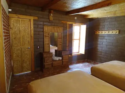 Cama o camas de una habitación en Hotel Finca Belén