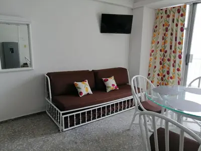 Una televisión o centro de entretenimiento en Suite Espectacular Torres Gemelas