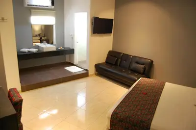 Una televisión o centro de entretenimiento en Hotel Dulce Boca