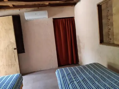 Cama o camas de una habitación en Cabañas jaysur