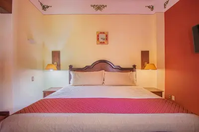 Cama o camas de una habitación en Hotel Casa Barrocco Oaxaca