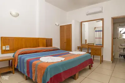 Cama o camas de una habitación en Hotel VidaMar