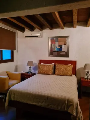 Cama o camas de una habitación en Villas Casa Divina At San Felipe Church Area