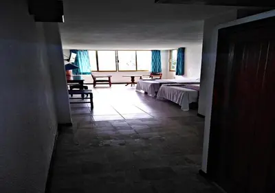 Cama o camas de una habitación en Hotel El Doral