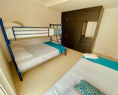 Cama o camas de una habitación en Alberca privada, vista al mar, frente playa foro boca