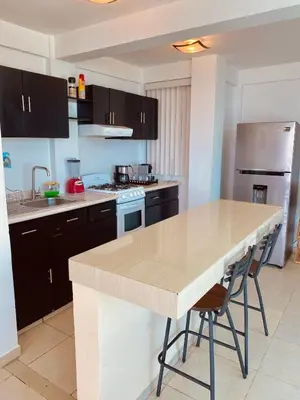 Una cocina o zona de cocina en Alberca privada, vista al mar, frente playa foro boca