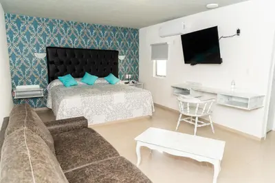 Una televisión o centro de entretenimiento en Hotel Kyrios Veracruz