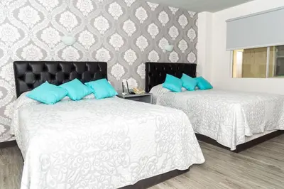 Cama o camas de una habitación en Hotel Kyrios Veracruz