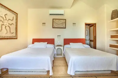 Cama o camas de una habitación en Villas San Vicente