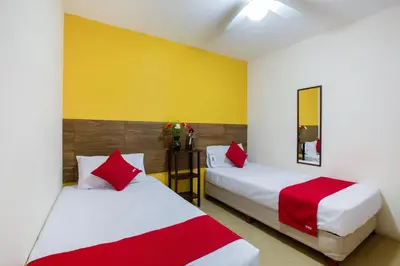 Cama o camas de una habitación en Hotel Villa Hermosa