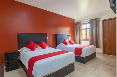 Cama o camas de una habitación en Capital O Hotel Emperadores Inn, Atlixco