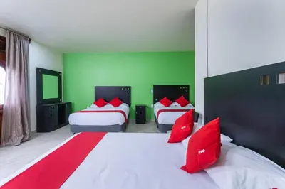 Cama o camas de una habitación en Capital O Hotel Emperadores Inn, Atlixco