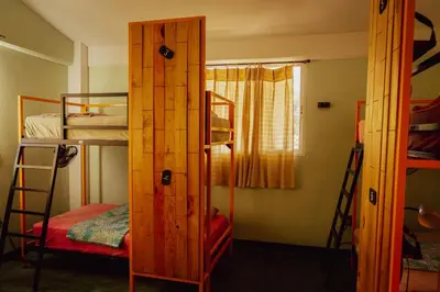 Cama o camas de una habitación en Nopalero Hostel