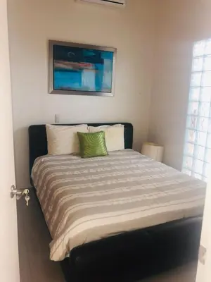 Cama o camas de una habitación en PuntaGaviota