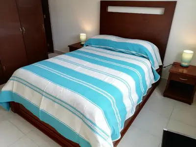 Cama o camas de una habitación en CORDIALITY INN