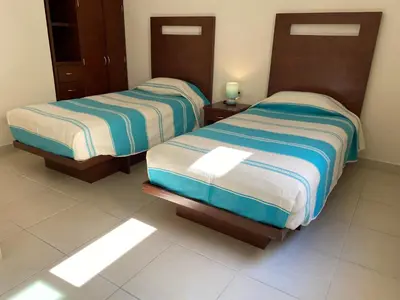 Cama o camas de una habitación en CORDIALITY INN