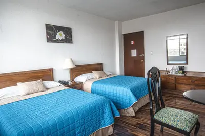 Cama o camas de una habitación en Hotel Palacio