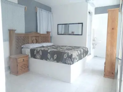 Cama o camas de una habitación en Hotel Juarez