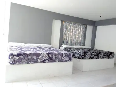 Cama o camas de una habitación en Hotel Juarez