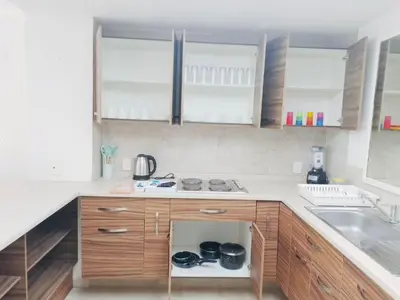 Una cocina o zona de cocina en Acapulco suites Y condominio Mediterrane