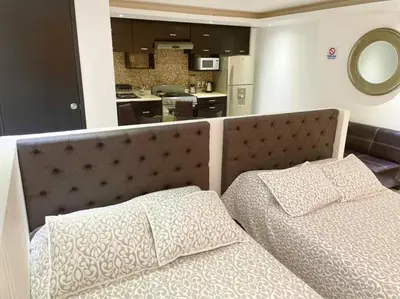 Una cocina o zona de cocina en Acapulco suites Y condominio Mediterrane