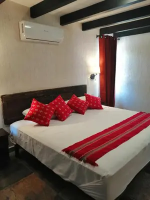 Cama o camas de una habitación en Hotel Casa del Agua