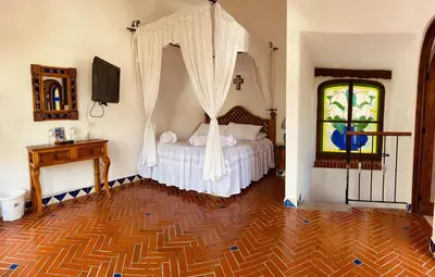 Cama o camas de una habitación en Posada Los Alcatraces